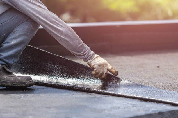 Professional Basement Waterproofing technician working in Wilmington, NC